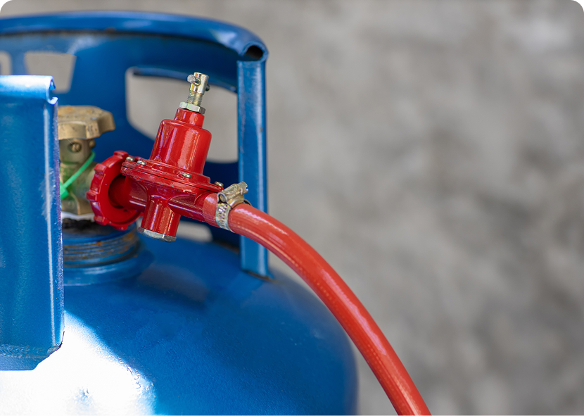 Blue gas tank and red hose