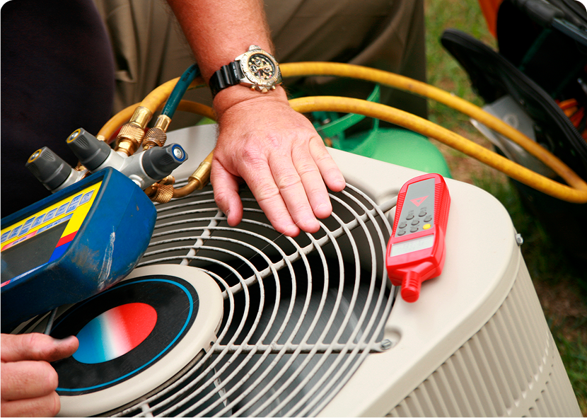 Hand on air conditioning unit